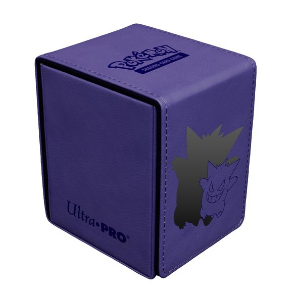 The Alcove Flip Box for Pokemon features a debossed image of Gengar on a leatherette finish with premium foil detailing. A strong magnetic closure keeps your cards safely secured inside, and dual thumb notches offer easy access to your deck. This Deck Box holds up to 100+ standard size trading cards double-sleeved in Ultra PRO Deck Protector sleeves. The lid can be detached from either side of the box to accommodate any play style.