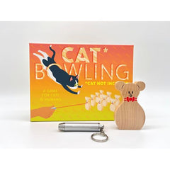 Finally, a game to play with your cat.
It’s as simple as pins, point, pounce! With Cat Bowling, let your cat be the bowling ball as you try to bowl the perfect game. A wonderful tool for spending quality time with your ferocious fur ball and the purr-fect gift for cat lovers (that they don’t already have ten of).
Cat Bowling comes with 10 solid wood mouse bowling pins and a laser pointer. Batteries included.