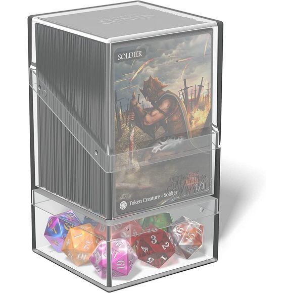 Ultimate Guard Boulder'n'Tray 100+ Clear. By popular demand, here is the Boulder'n'Tray 100+. This deck case combines the sturdiness of our Boulder with the flexibility of an extra compartment for your dice and other accessories - just like our classic Monolith. Our Boulder'n'Tray 100+ impresses with its durable, soft-touch finish², which ensures a comfortable grip and long life during all your gaming sessions. - Holds up to 100 standard size cards