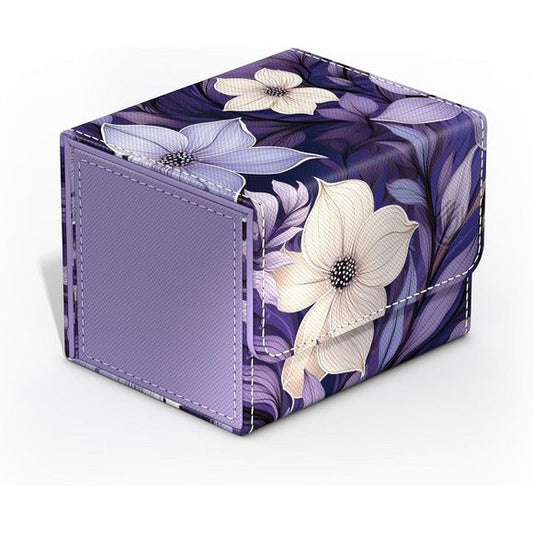 Ultimate Guard’s popular “Floral Places” Sidewinder series is back with six brand new designs – and for the first time also with deck boxes in the 133+ size, perfect for Magic: The Gathering’s Commander format! Our Sidewinder deck boxes feature a resistant Xenoskin outer casing, quality microfiber inner lining, and a strong magnetic closure. Depending on the variant, they are designed to hold 100 or 133 double-sleeved cards in Ultimate Guard Sleeves of trading card games like Magic: The Gathering, Pokémon,