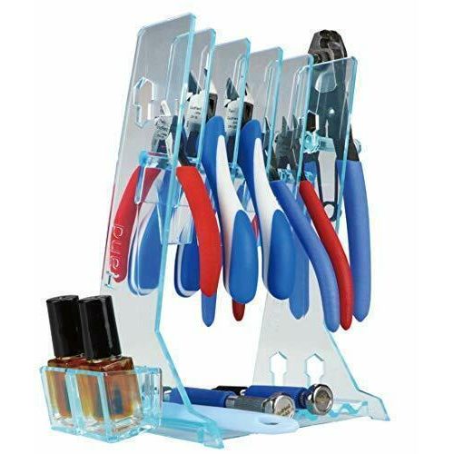 Tools such as nippers and pliers that tend to become cluttered during work can be stored stylishly and safely. Organize your workspace and improve your production efficiency! Up to 5 nippers or pliers can be stored on this stand. The stand is made of highly flexible resin, so it is difficult to break. The bottom of the stand is ideal for storing pen-type tools such as pin vise, or hobby knives that can easily roll off your table. Up to 7 can be stored at once! Approximate size: Height: 190mm (7.5"), Wi