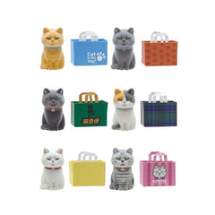 Grumpy never looked this cute. These irresistibly fluffy “cats in paper bags” are back for round two, bringing even more attitude and charm in this fun blind box series. Each figure features a moody little cat popping out of its own paper bag, capturing that perfectly relatable “don’t talk to me” expression—softened by a fuzzy flocked finish that makes them extra huggable (even if they don’t look like they want it).
Every box holds one surprise design out of six unique cats, each with its own personality,