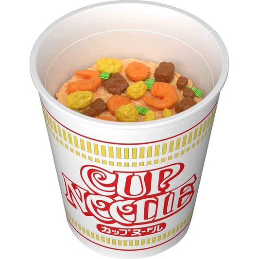 Here's one Cup Noodle that won't be ready in just three minutes! Bandai subjected a real Cup Noodle to 3D scanning to realistically reproduce the dense, intricate noodle mass inside that familiar styrofoam cup, and the egg bits, shrimp and "mysterious meat" (yes, that's what Bandai calls it!) were also 3D scanned and are precisely designed as individual parts. The green onion flakes are cut out of vinyl material, and you can add them as you like. The Cup Noodle logo and designs on the cup are separated by c