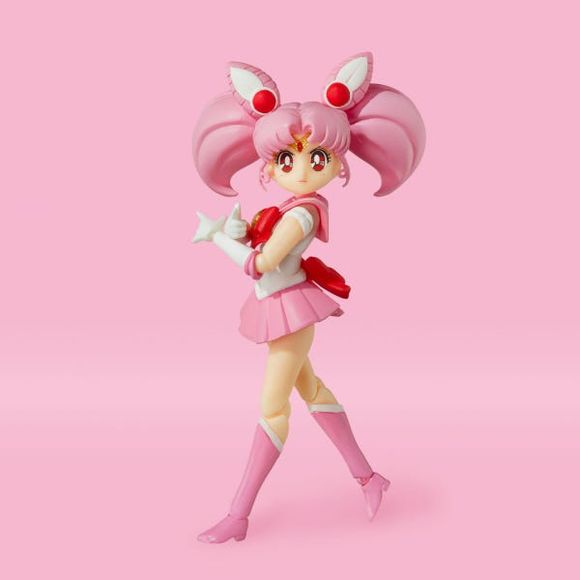 <p>Sailor Moon Chibi rejoins S.H.Figuarts, in a new edition specially colored to evoke her appearance in the 1990s Sailor Moon animated series! This highly posable action figure captures all of Sailor Chibi Moon's cuteness, with accurate proportions and an all-new, gorgeously designed display package! This Item comes with Chibi Moon figure, 3 Face plates, 5 Pairs of replacement wrists, Alternate bangs, Pink moon stick and a Set of dedicated pedestals.</p>