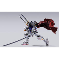 The long-awaited Metal Build version of Gundam Barbatos includes new equipment devised by director Tatsuyuki Nagai and designed by mechanical designer Naohiro Washio, and features a new look complete with a Boomerang Mace and crimson-colored cape!
The frame portion is made with die-cast components, incorporating unique structures in the fuselage and other areas. The Gundam frame, which embodies the Alaya-Vijnana System, is dynamically depicted in this figure. 7.1 inches tall (18cm). Made of ABS, PVC, and d