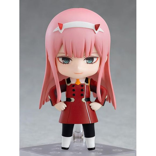 "Won't you be my darling?"

From the popular anime series "DARLING in the FRANXX" comes a rerelease of the Nendoroid of Zero Two wearing her uniform! She comes with three face plates including a fearless smile, an innocent smile with closed eyes as well as a sidelong glance with an open mouth that can be used to display her sucking a lollipop or with her tongue out! The bacon from the start is also included allowing you to recreate the iconic scene bacon eating scene from the series! Her jacket and hat ar