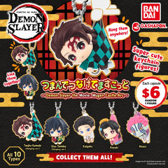 Bring home a piece of Demon Slayer: Kimetsu no Yaiba – The Movie: Infinity Castle with the Tsuman de Tsunagete Mascot Gashapon series from Bandai! These adorable chibi-style mascots feature characters from the Infinity Castle arc in unique hanging poses.
Each mascot includes both a ball chain and lobster clasp, allowing you to attach it to bags, keys, displays, or even connect multiple mascots together. The complete collection features 10 different styles, including characters such as Tanjiro Kamado, Giyu