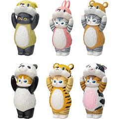 Meet the Mofusand Soft Vinyl Collection Blind Box, a delightful set of upright-standing cats adorned with cozy hoods resembling various animals like pandas, tigers, rabbits, and puppies. Crafted from soft vinyl, these charming figures are a joy to hold and display. At approximately 3 inches tall, each cat is perfect for brightening up your shelf, workspace, or collection cabinet. Each blind box offers a surprise with its unique design.