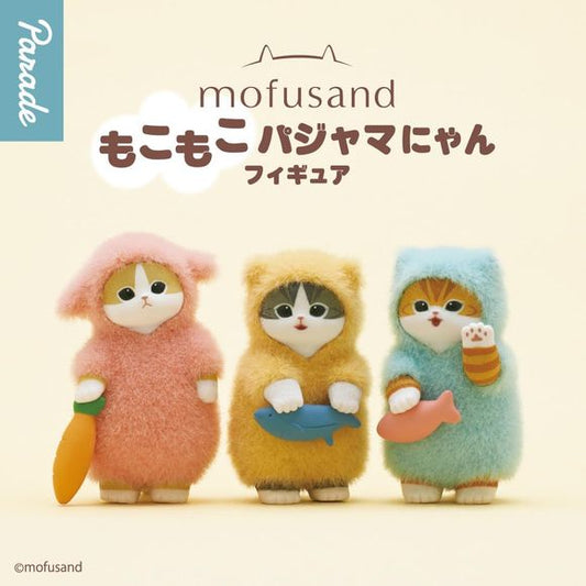 Mofusand’s beloved cats get extra cozy in the Fluffy Pajama Figure Blind Box series. Each mini figure features a wide-eyed kitty wrapped in soft, pajama-style outfits with a fuzzy, textured look that perfectly matches Mofusand’s signature gentle charm. The relaxed poses and pastel tones give these figures a warm, comforting presence that feels right at home on shelves, desks, or curated display corners. Small in size but rich in personality, this blind box series delivers that irresistible mix of calm, cute