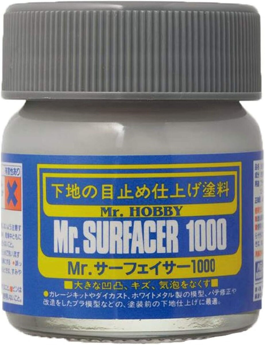 Mr.SURFACER 1000 contains finer granules than Mr.SURFACER 500. They are both used in much the same way but due to the finer granules after sanding with waterproof sand-paper, a perfectly corrected surface is possible. Available in bottle and spray. Provides neutral color background and prepares surface for paint application. 40ml. Shipping in continental US only, ground shipping only - no expedited service.