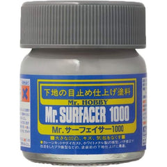 Mr.SURFACER 1000 contains finer granules than Mr.SURFACER 500. They are both used in much the same way but due to the finer granules after sanding with waterproof sand-paper, a perfectly corrected surface is possible. Available in bottle and spray. Provides neutral color background and prepares surface for paint application. 40ml. Shipping in continental US only, ground shipping only - no expedited service.