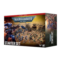 Release Date 7/25/2026
The Warhammer 40,000 Starter Set includes:
-1 softcover Core Rules booklet
-1 softcover Starter Set Handbook
-2 double-sided Reference Sheets
-46 multipart plastic push-fit miniatures
– 1 Captain with Relic Shield
– 1 Librarian
– 5 Intercessors
– 5 Vanguard Veterans with Jump Packs
– 1 Land Speeder
– 1 Warboss
– 1 Weirdboy
– 20 Ork Boyz
– 10 Gretchin
– 1 Wartrakk
-15 multipart plastic push-fit terrain pieces
-2 foldout game boards
-2 range rulers
-10 dice
The kit comes supplied with: