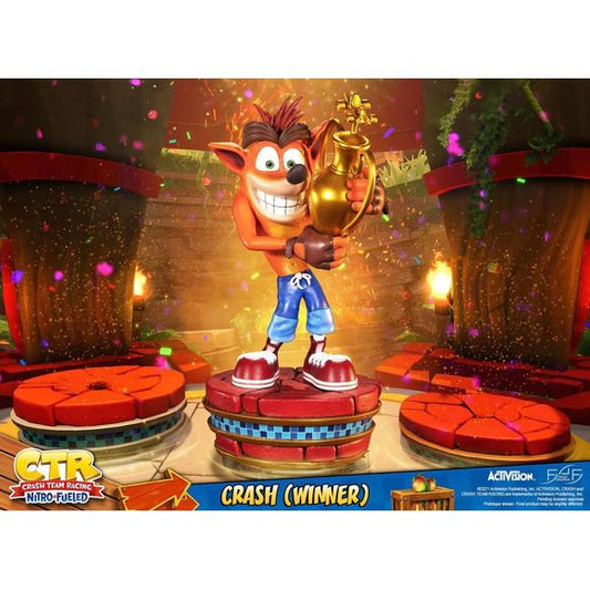 First 4 Figures is proud to introduce their latest resin collectible, Crash (Winner).
The concept for this statue is based on the Crash Team Racing™ Nitro-Fueled logo in the home screen of the game, where Crash is holding the trophy. The base design replicates the winners' pedestal from the iconic N. Sanity Beach area, which is the first area in the game.
And, speaking of base, looking at the number of layers on the base and the fact that the rings around the base are gold, you can tell that Crash took 1s