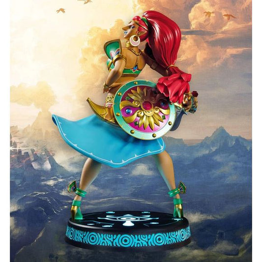 This statue has no edition number, and was a replacement and is in new and unopened condition. 
First 4 Figures proudly presents Gerudo Champion and pilot of the Divine Beast Vah Naboris: Urbosa Exclusive Edition! She is brought to life with stunning detail in this high-quality PVC statue. Her dynamic pose makes her appear in mid-twirl, with her skirt and hair flowing free. The base’s design features the Sheikah Eye symbol, consistent with the other statues in the First 4 Figures The Legend of Zelda: Breat
