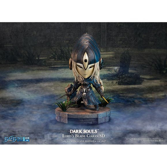 This statue has no edition number, and was a replacement and is in new and unopened condition. 
Ciaran's armour—Lord's Blade Set has been beautifully replicated here with realistic details. Her Gold and Dark Silver Tracer are key details included in this statue as well! Her armour is common to all Lord's Blades but the porcelain mask is unique to her, representing a mark of honour.
The Exclusive Edition will come with a small memorial grave of Artorias and the white flower left by Ciaran on said grave.
D