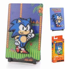 A confident blue hedgehog with lightning speed and a playful smirk, always ready to race into action.
FiGGYZ are Pop Magnet Collectibles - pixel-art characters that snap magnetically onto display-ready backdrops.
Each one features:
A reversible metal display
Side A: Themed background related to the character
Side B: Classic Background, typically of the franchise
A magnetized figure raised off the surface using MagMounts™ for a 3D pop out feeling
Comes with a display base for shelves and a magnetic sticke