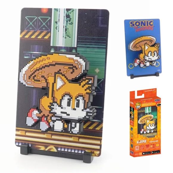 <p><strong>FiGGYZ Sonic the Hedgehog – Tails (Face-Off) #178</strong> features Sonic’s high-flying sidekick in bold pixel-art style with a raised magnetic 3D design. This officially licensed collectible includes a reversible metal backdrop, display base, and magnetic mounting sticker, giving fans multiple ways to showcase Tails on a shelf, desk, wall, or other magnetic surface.</p>
<p>Perfect for Sonic the Hedgehog fans, retro gaming collectors, and pop culture displays, this compact collectible makes a fu