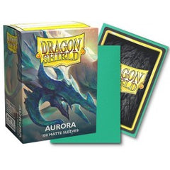 Procoris' tail sways in the aurora-lit sky, adding to the beautiful ribbons of color that glide across the heavens. The lights reflect off the moongem horns and armor as the Sun Wielder glides above the Moonborn Lake. In its second installment, the Player's Choice sleeve features the color Aurora. Both color and artwork were voted for by the Dragon Shield online community. The artist, Daniele Procopio, is a fan of the creative illustrations on TCG cards, and enjoys combining her love for reptiles and fantas