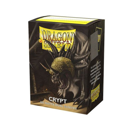 Crypt, eerie and macarbe. Dragon Shield Matte Dual sleeves. Clear front and a textured matte back. Fully opaque sleeves with a black interior, an elegant backdrop for black bordered cards. The sturdy cardboard box fits 75+ single sleeved cards or 65+ double sleeved cards. Every box has a label on the top for personalization.