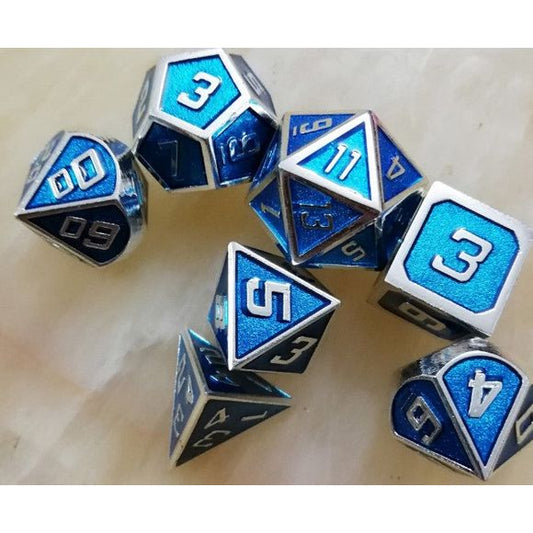 The perfect companion for your gaming needs! These premium die-cast polyhedral dice are exactly what you've been searching for that upcoming game night with the group. Stored in a quality, brushed metal tin with foam insert. These dice are a rich metal with nice weight to them and engraved each with crisp, easy-to-read numerals. Many styles and colors are available.
This set includes one of each: d20, d12, d10, d10 (percentile), d8, d6, and a d4 (7 dice in total). All inside the Galactic Toys Dice Tin.