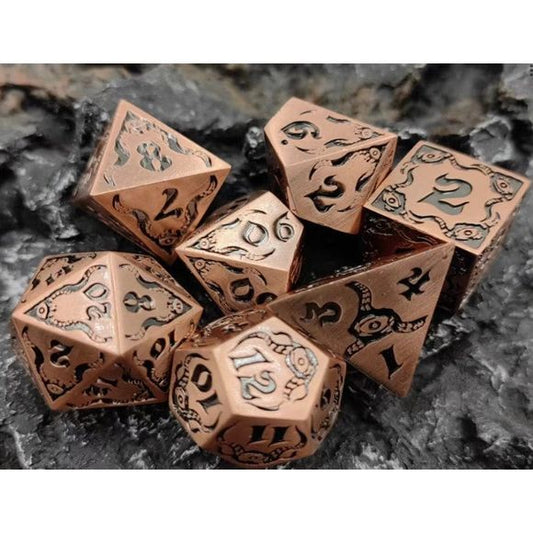 The perfect companion for your gaming needs! These premium die-cast polyhedral dice are exactly what you've been searching for that upcoming game night with the group. Stored in a quality, brushed metal tin with foam insert. These dice are a rich metal with nice weight to them and engraved each with crisp, easy-to-read numerals. Many styles and colors are available.
This set includes one of each: d20, d12, d10, d10 (percentile), d8, d6, and a d4 (7 dice in total). All inside the Galactic Toys Dice Tin.