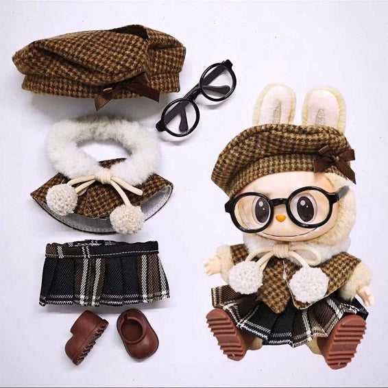 Outfit includes Beret, Scarf, Bloue, Skirt and shoes for your favorite Labubu. Customize and accessorize yours today! Labubu and glasses not included.