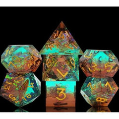 The perfect companion for your gaming needs! These premium, high-end resin are exactly what you've been searching for that upcoming game night with the group. These dice are quality resin with nice weight to them and engraved each with crisp, easy-to-read numerals. Many styles and colors are available.
This set includes one of each: d20, d12, d10, d10 (percentile), d8, d6, and a d4 (7 dice in total)!
WARNING: These dice are extra sharp! Use with caution