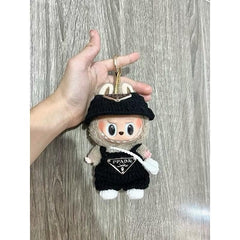 Outfit includes a hat and overalls perfectly designed to fit your favorite Labubu. Customize and accessorize yours today! Labubu not included.