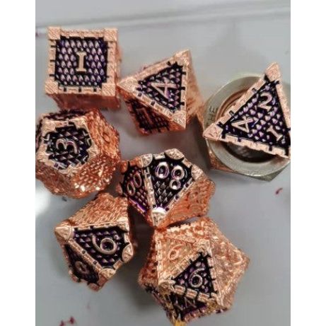 The perfect companion for your gaming needs! These premium die-cast polyhedral dice are exactly what you've been searching for that upcoming game night with the group. Each set weighs roughly 5 ounces and are stored in a quality, brushed metal tin with foam insert. These dice are engraved with crisp, easy-to-read numerals. Many styles and colors are available.
This set includes on of each: d20, d12, d10, d10 (percentile), d8, d6, and a d4 (7 dice in total). All inside the Galactic Toys Dice Tin.
