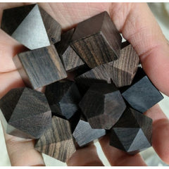 The perfect companion for your gaming needs! These premium, high-end cut wood polyhedral dice are exactly what you've been searching for that upcoming game night with the group.They are stored in a quality, brushed metal tin with foam insert. These dice are a rich quality wood with nice weight to them and engraved each with crisp, easy-to-read numerals. Many styles and colors are available.
This set includes on of each: d20, d12, d10, d10 (percentile), d8, d6, and a d4 (7 dice in total). All inside the Gal