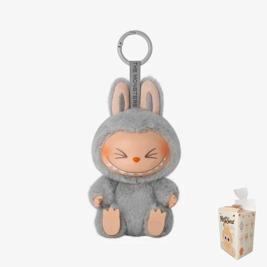 POP MART Labubu HEHE Plush — V2 Have A Seat Series, authentic, opened only for verification.
HEHE is part of The Monsters' "Have A Seat" series, capturing Labubu mid-perch in his signature curled-up, legs-dangling pose. This is a genuine POP MART release: the packaging has been opened to verify contents and will ship with the original box and all included materials, but the figure itself has never been displayed or used.
Authenticity QR code has NOT been redeemed — you'll be able to scan and verify it you