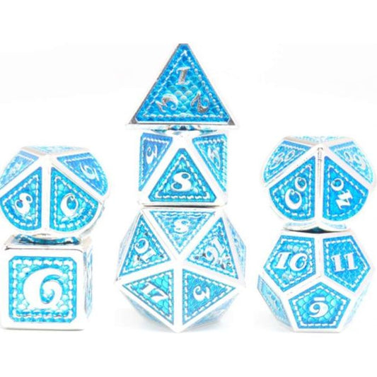 The perfect companion for your gaming needs! These premium die-cast polyhedral dice are exactly what you've been searching for that upcoming game night with the group. Stored in a quality, brushed metal tin with foam insert. These dice are a rich metal with nice weight to them and engraved each with crisp, easy-to-read numerals. Many styles and colors are available.
This set includes one of each: d20, d12, d10, d10 (percentile), d8, d6, and a d4 (7 dice in total). All inside the Galactic Toys Dice Tin.
