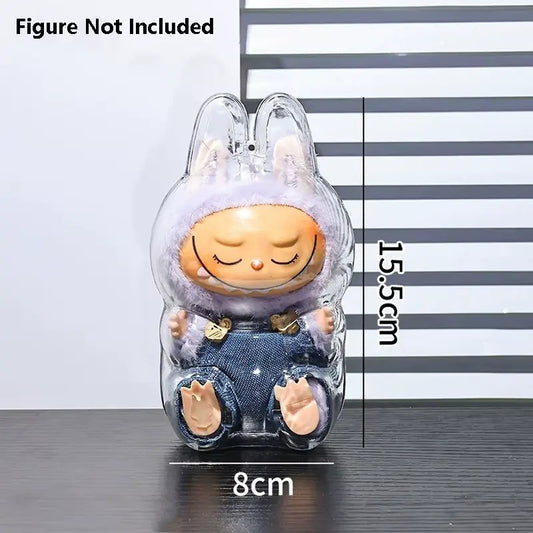 Labubu Clear Protective Case Cover, Sitting Version – crystal-clear shell for Labubu plush and vinyl figures. Keep your Labubu safe and looking adorable wherever you go with this crystal-clear protective shell, shaped specifically to fit Labubu's iconic silhouette (bunny ears and rounded body included) in the seated pose.
Made from sturdy, transparent plastic to shield your plush from dirt, dust, scratches, and light rain — lightweight yet strong enough to clip to backpacks, bags, or display shelves. Fully
