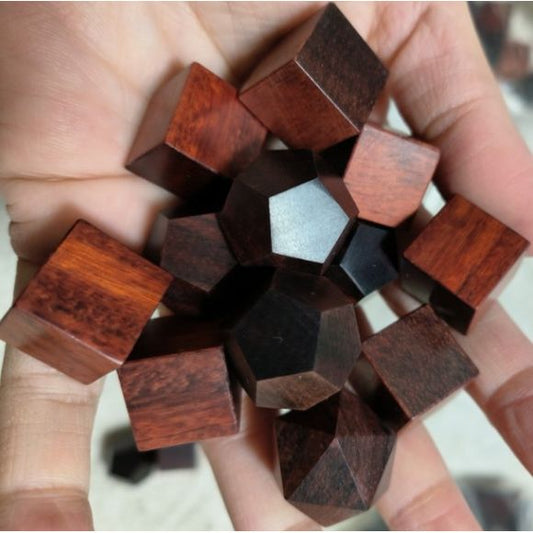 The perfect companion for your gaming needs! These premium, high-end cut wood polyhedral dice are exactly what you've been searching for that upcoming game night with the group.They are stored in a quality, brushed metal tin with foam insert. These dice are a rich quality wood with nice weight to them and engraved each with crisp, easy-to-read numerals. Many styles and colors are available.
This set includes on of each: d20, d12, d10, d10 (percentile), d8, d6, and a d4 (7 dice in total). All inside the Gal