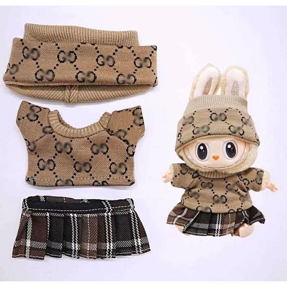 Outfit includes a headband, blouse, and skirt perfectly designed to fit your favorite Labubu. Customize and accessorize yours today! Labubu not included.