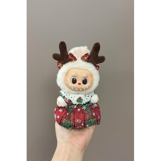Ho ho ho! Has your Labubu been naughty or nice? Outfit includes reindeer antlers, blouse, and skirt for your favorite Labubu. Customize and accessorize yours today! Labubu not included.