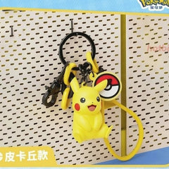 Take Pikachu along on every adventure with this adorable Pikachu Charm Keychain by Langbowang! Featuring Pikachu in a cheerful seated pose with its signature bright smile and rosy cheeks, this collectible accessory is perfect for Pokémon fans looking to add a touch of fun to their everyday carry.
The keychain includes a detailed Pikachu figure, a classic Poké Ball charm, colorful accent links, a durable metal clasp, and a convenient wrist strap for easy attachment to keys, backpacks, purses, and more. Its