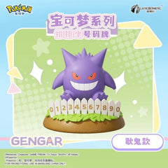 Add a mischievous touch to your Pokémon collection with this Gengar Number Plate Display Figure by Langbowang! Featuring the Ghost-type favorite flashing its iconic grin from behind a decorative white picket fence, this collectible combines spooky charm with a fun interactive display element.
Gengar's signature purple coloring, piercing red eyes, and toothy smile are faithfully recreated in a cute, stylized design that captures the playful side of this fan-favorite Pokémon. The figure sits atop a grassy di