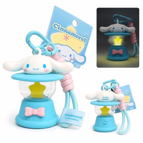 Bring a touch of Sanrio charm wherever you go with this adorable Cinnamoroll Light-Up Lantern Keychain! Designed with Cinnamoroll perched atop a pastel blue lantern, this cute accessory features a glowing star-shaped light inside the lantern chamber. Simply activate the light for a warm, whimsical glow that's perfect for backpacks, purses, keys, or collecting.
The included carabiner clip and matching wrist strap make it easy to attach to your favorite bag, while the compact size makes it a fun everyday com