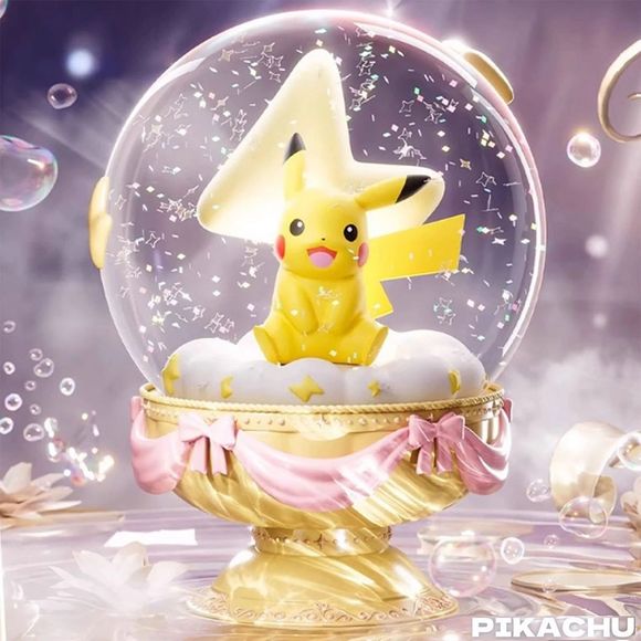 Celebrate the magic of everyone's favorite Electric-type icon with this officially licensed Pokémon Pikachu Dreamy Crystal Ball Figure! This premium collectible features an incredibly cute Pikachu sitting atop a fluffy cloud base, encased within a clear, glitter-filled display globe.
The entire globe rests on a beautifully detailed, ornate gold pedestal draped with pink ribbons and delicate bows, making it an enchanting addition to any Pokémon collection or display shelf.