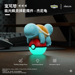 Catch some nighttime charm with the Pokémon Glow-in-the-Dark Poké Ball Display Figure Collection from Langbowang! This adorable series features fan-favorite Pokémon peacefully resting atop Poké Balls, creating a whimsical display that's perfect for any Pokémon trainer's collection.
Each figure showcases a beloved Pokémon in a sleeping pose balanced on a classic Poké Ball base. By day, the figures make charming desktop decorations, while the glow-in-the-dark Poké Ball bases emit a soft luminous effect after