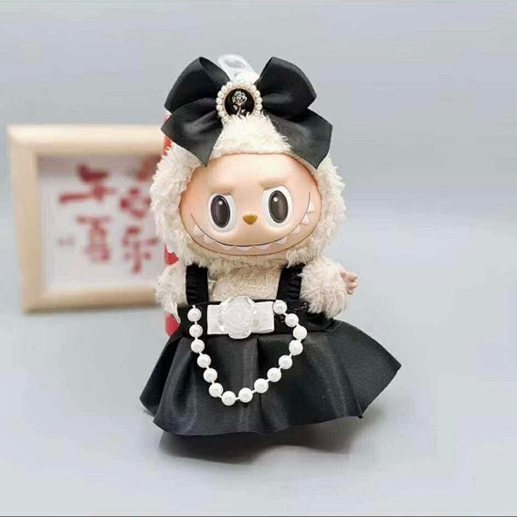 What are you wearing to the Gala? Outfit includes a lovely dress and bow for your favorite Labubu. Customize and accessorize yours today! Labubu not included.