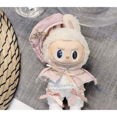 All hail her royal highness, Princess Labubu! Out for a casual outing with the finest fashion Outfit includes a hat with jewelery, shoes, cape, corset, and pants for your favorite Labubu. Customize and accessorize yours today! Labubu not included.