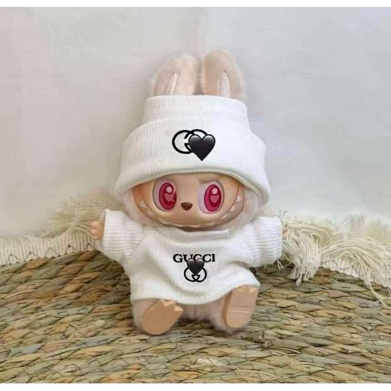 Outfit includes Sweater, knit cap, headphones, and shoes. Customize and accessorize yours today! Labubu not included.