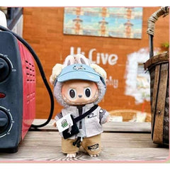 Outfit includes a hat, shirt, shorts, jacket, bag and shoes for your favorite Labubu. Customize and accessorize yours today! Labubu not included.