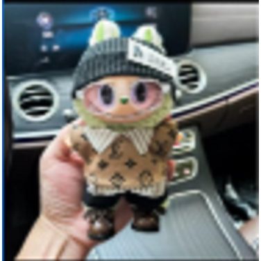 Outfit includes a brown shirt, black headband, and black shorts perfectly designed to fit your favorite Labubu. Customize and accessorize yours today! Labubu and accessories not included.