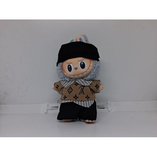 Outfit includes a brown shirt, black headband, and black shorts perfectly designed to fit your favorite Labubu. Customize and accessorize yours today! Labubu and accessories not included.