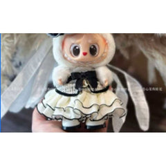 Outfit includes an elegant party dress for your favorite Labubu. Customize and accessorize yours today! Labubu and hat not included.