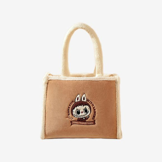 POP MART Classic Bag Series – LABUBU Plush Tote Bag (Brown) – authentic Labubu everyday tote. Carry style and character with this chic, plush tote from POP MART's Classic Bag Series featuring everyone's favorite Labubu. Crafted in rich brown tones with a soft-texture finish, it blends collectible flair with everyday functionality.
Approximate dimensions: 34 cm H × 16 cm W × 27 cm D (13.39" × 6.3" × 10.63"). Authentic POP MART release.