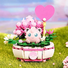 <p>Bring a little sweetness to your Pokemon collection with the <strong>Keeppley Pokemon Jigglypuff Flower Garden Building Block Set</strong>!</p>
<p>Inspired by Jigglypuff, the adorable Balloon Pokemon, this officially licensed Pokemon building set features the beloved pink Pokemon relaxing in a beautiful garden filled with colorful flowers and lush greenery. With its round pink body, large blue eyes, signature curled tuft of hair, and cheerful expression, Jigglypuff makes an irresistibly cute centerpiece